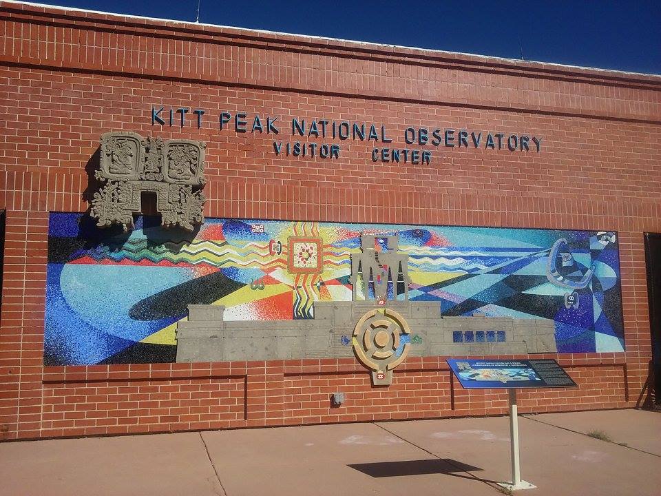 Kitt Peak visitor center with a mural showing art
													 by the indiginous and original inhabitants of the region
