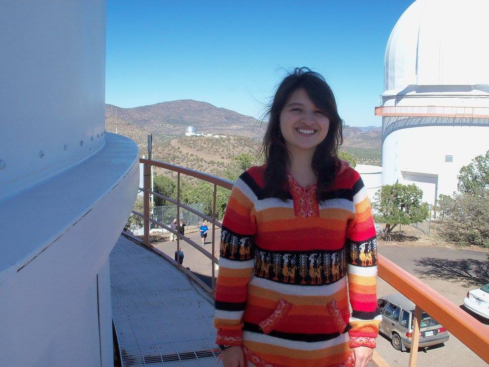 Sofía on top of the 82-inch telescope with the 107
														inch and the HET 10-m telescopes in the background
